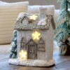 Hus til dekoration m. LED stjerner H29 cm
